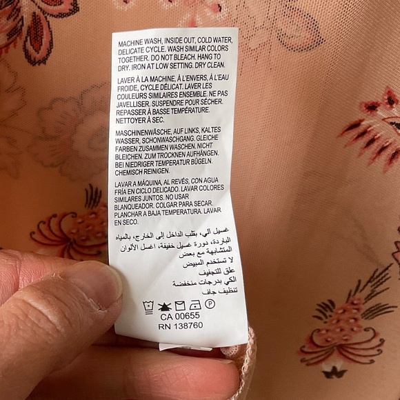 NWT Love and Legend nude mesh top with floral print and bell sleeves. - Picture 13 of 14